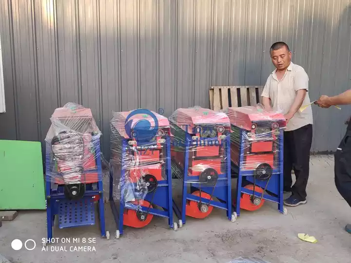 corn peeling and threshing machine