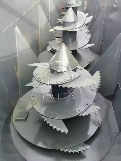 internal blades of a feed mixer