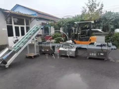 drum nursery seeder with material elevator